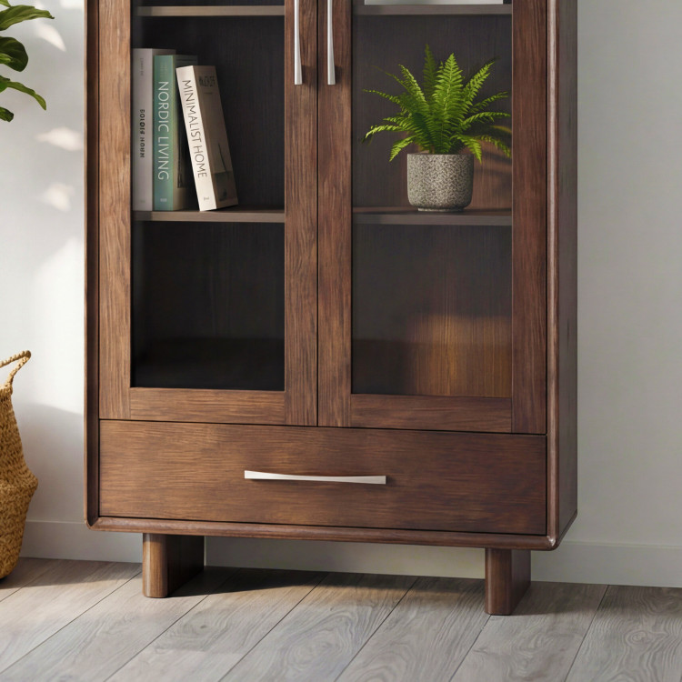 Vitrin üveges ajtóval és fiókkal dió színben